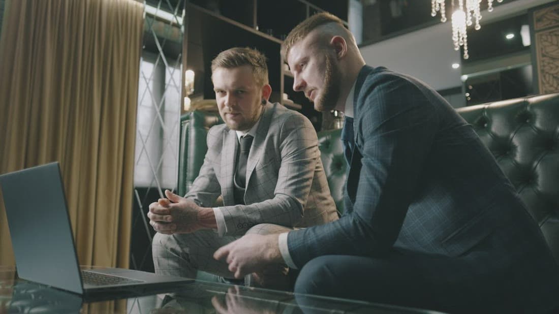 Business executives discussing a digital transformation project in a meeting